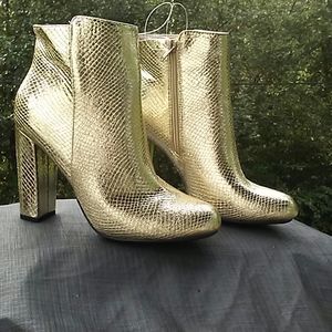 Shiny gold boots